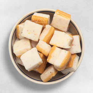 Nougat Kokoskuchen Würfel süßes Konfekt zart cremig Bio Qualität exotische Spezialität aus Wien