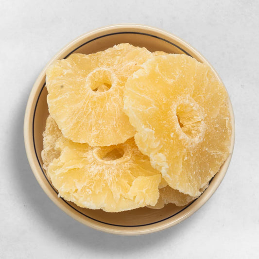 Getrocknete Ananasringe Bio Qualität zuckerfrei tropischer Fruchtsnack naturbelassen gelb fruchtig süß ballaststoffreich ohne Zusatzstoffe