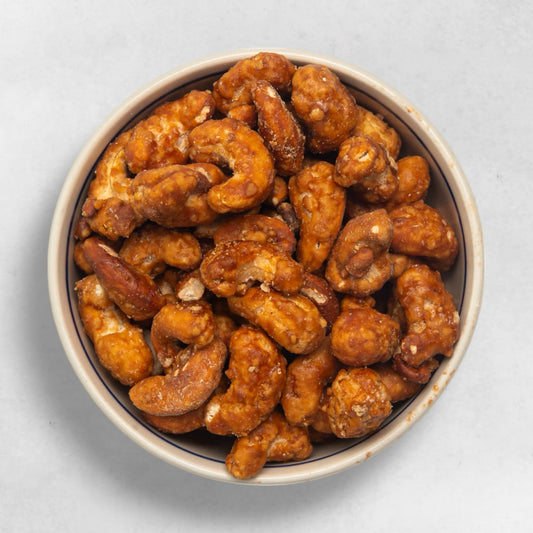 Gebrannte Cashews mit Banane süßer Snack exotische Nüsse karamellisiert fruchtig proteinreich vegan aus Wien